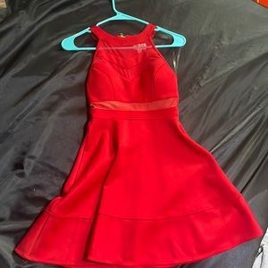 Red dress, xs from Dillards, the brand is honey and Rosie. Worn once.
